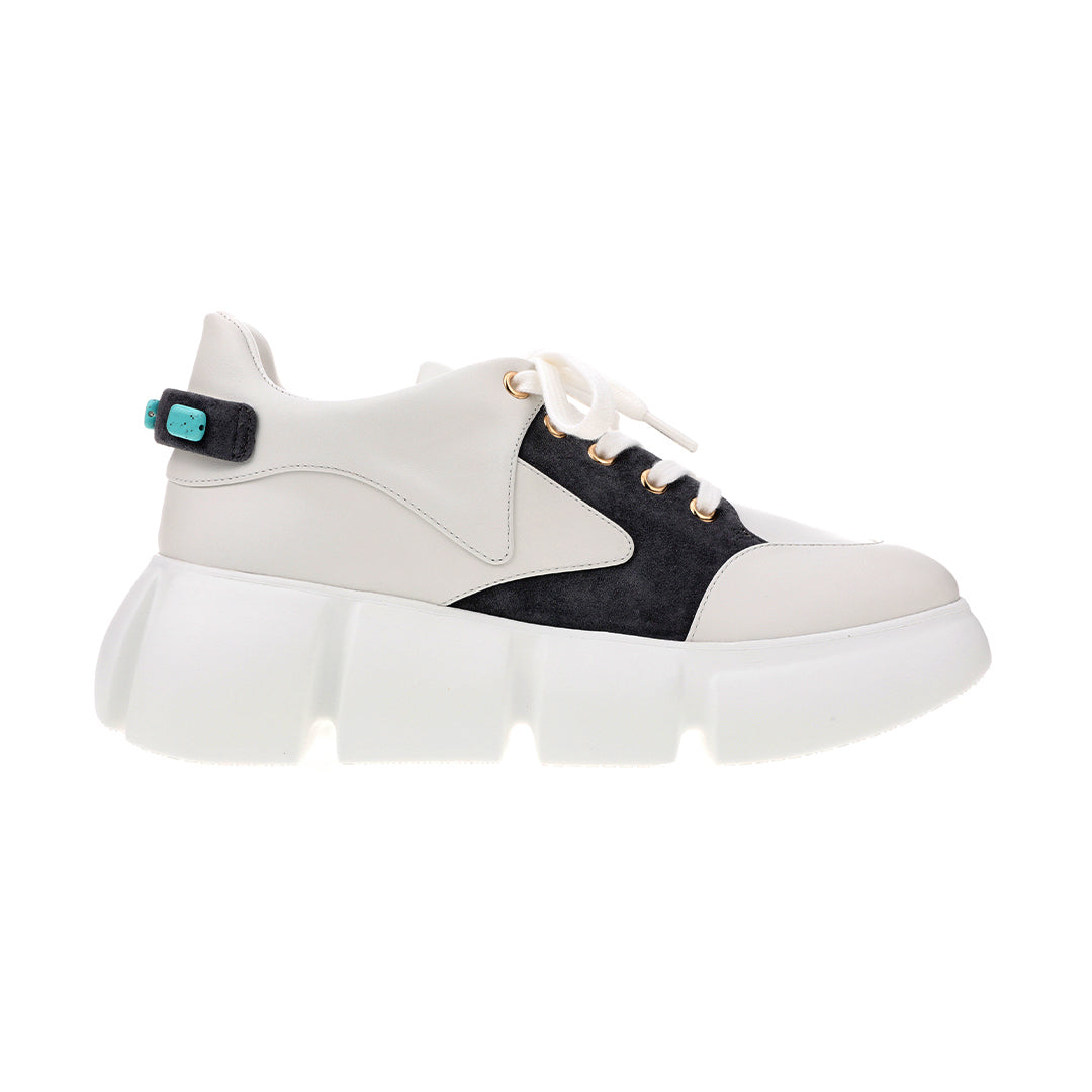 Women's black and white cowhide stitched sneakers