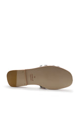 Black and white cowhide and canvas leather slippers