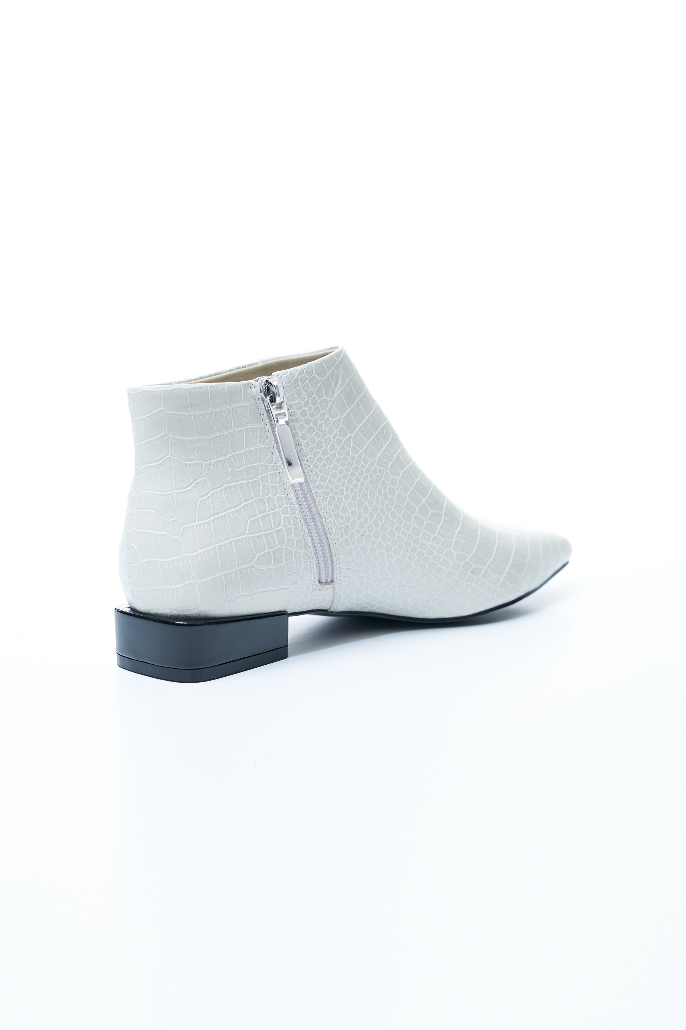 white pointed toe booties